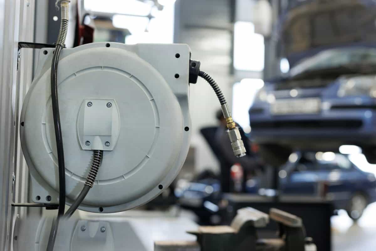 A coil for distributing compressed air and water in a car service station.