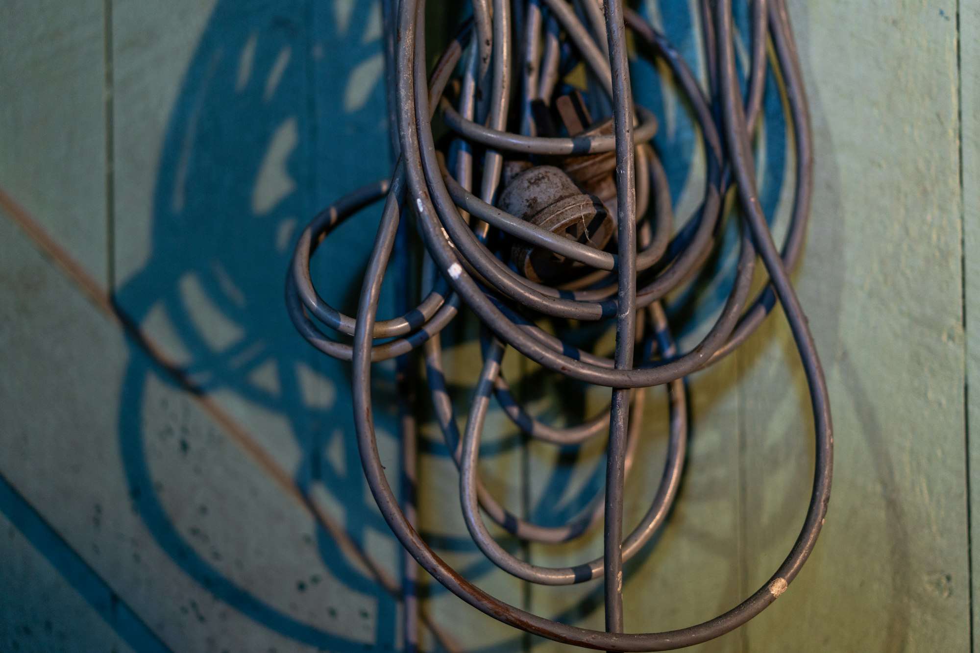 grey extension cord ready to use to plug in electric items