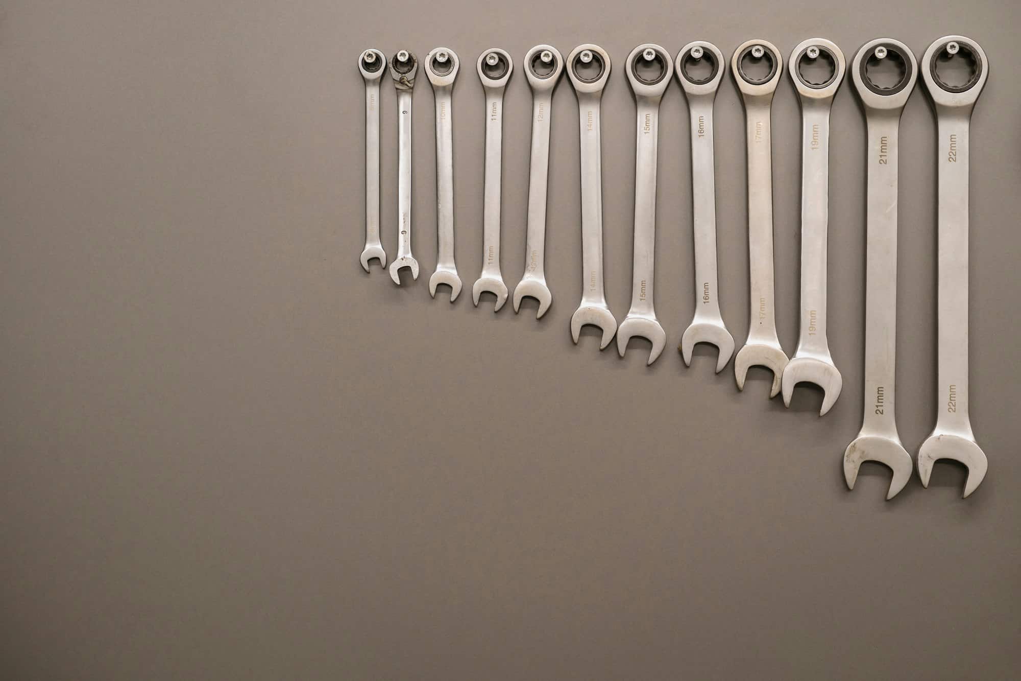 Metal keys on gray background. Copy space