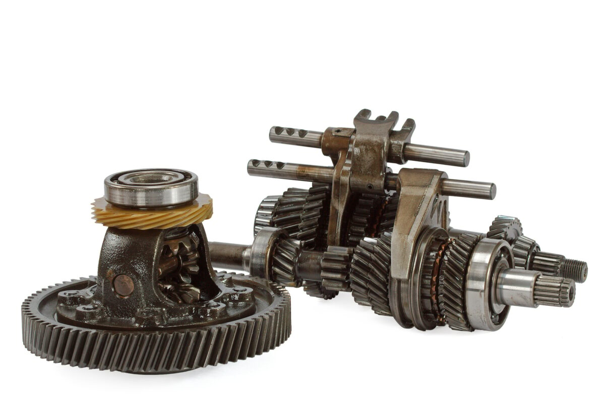 Pinions and differential  from  gearbox, isolated on white backg