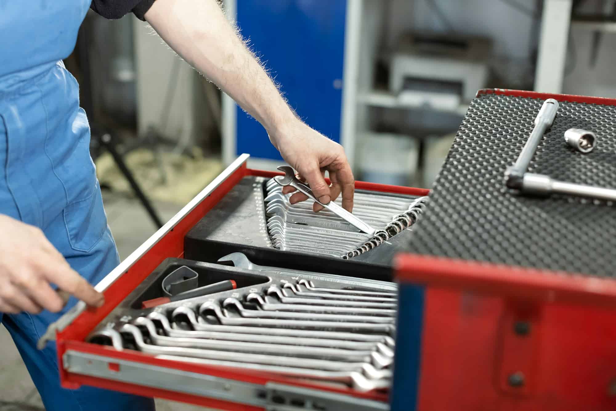Professional red toolbox. A set of tools for repair in car service.