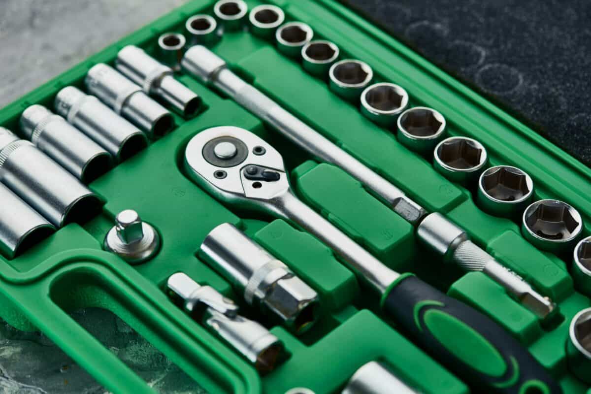 Set of spanners with ratchet in green toolbox