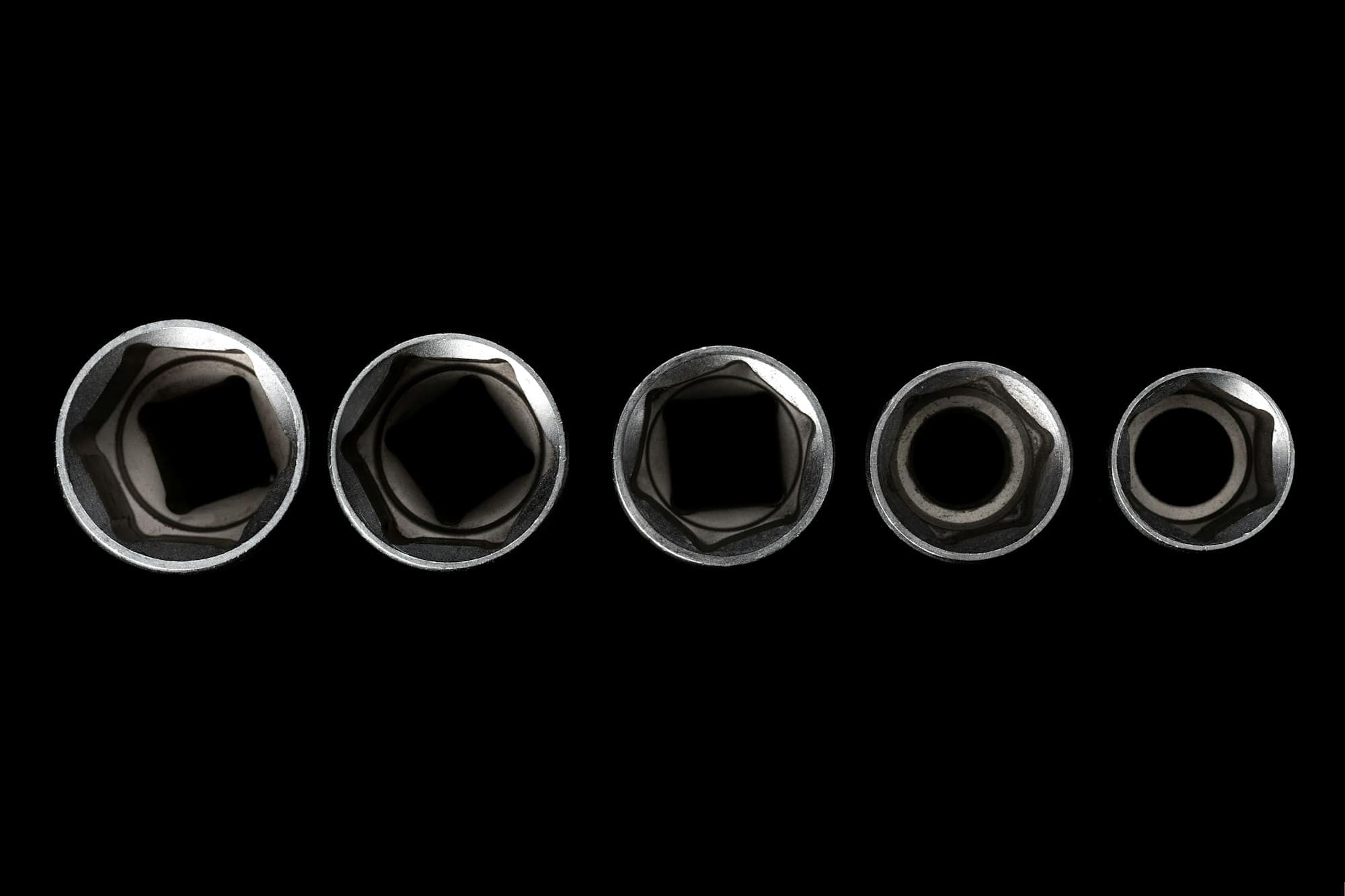 Socket heads isolated on black background
