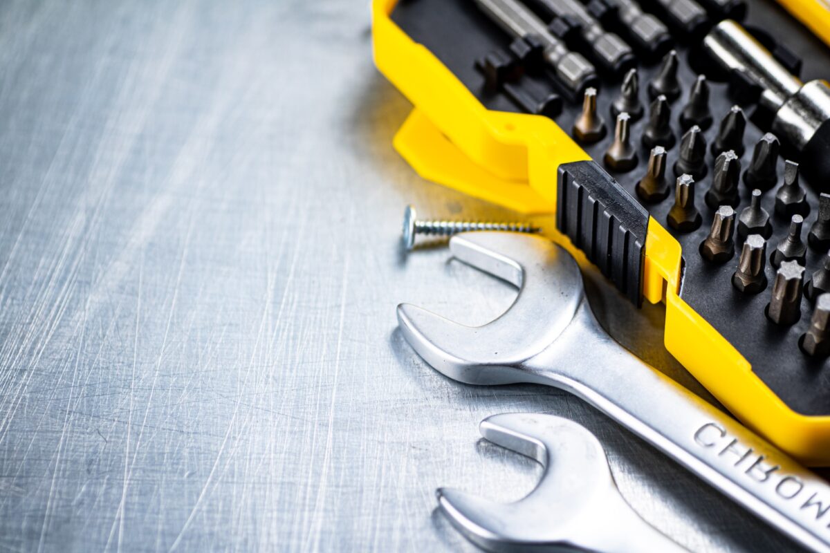 A set of bits with wrenches.
